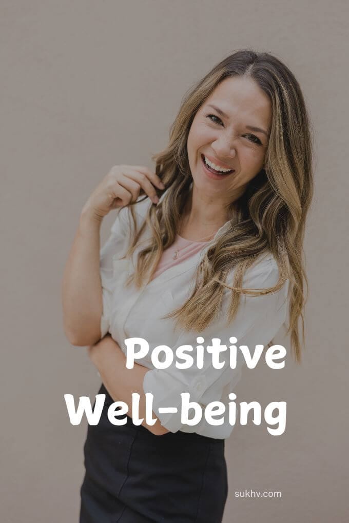 A smiling woman with the phrase 'Positive well-being' symbolizing a life of happiness and satisfaction.